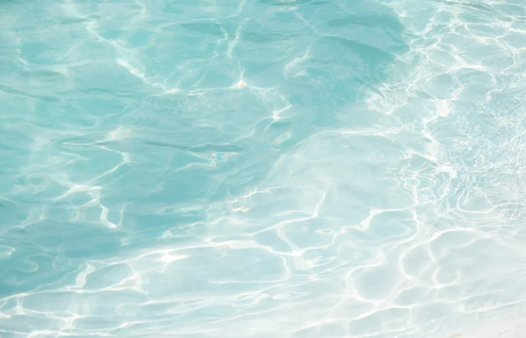 Clear turquoise pool water in sunlight